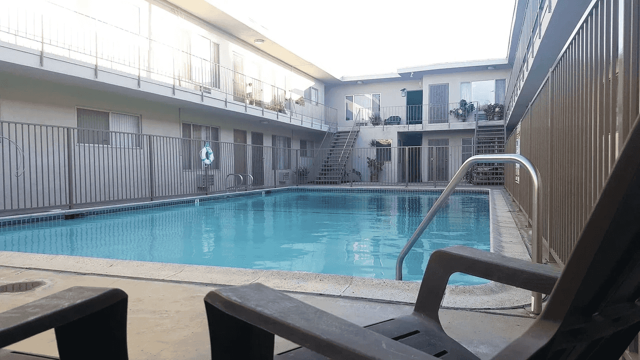 Pico Rivera Collection poolside sundeck with courtyard apartment views